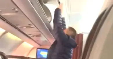 Passenger Tries To Steal From Overhead Bin — Gets Caught, Slapped Again And Again - View from the Wing